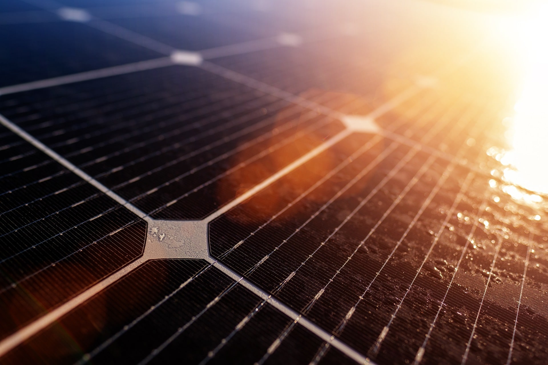 Solar panels glistening under sunlight, with rays of light emphasizing the efficiency and sustainability of a well-designed solar system.