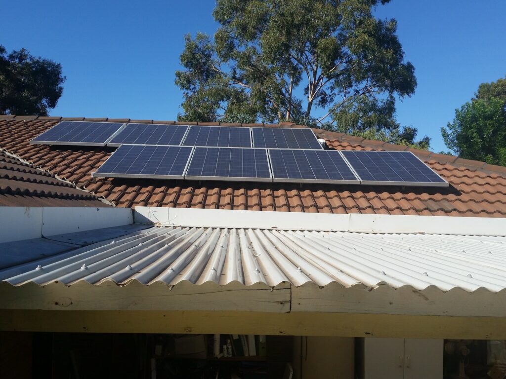 Solar panels installed on a rooftop, showcasing an efficient solar system for renewable energy generation and eco-friendly living.